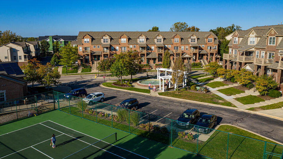 Tennis court and beautiful entrance to Barclay Park Condos
