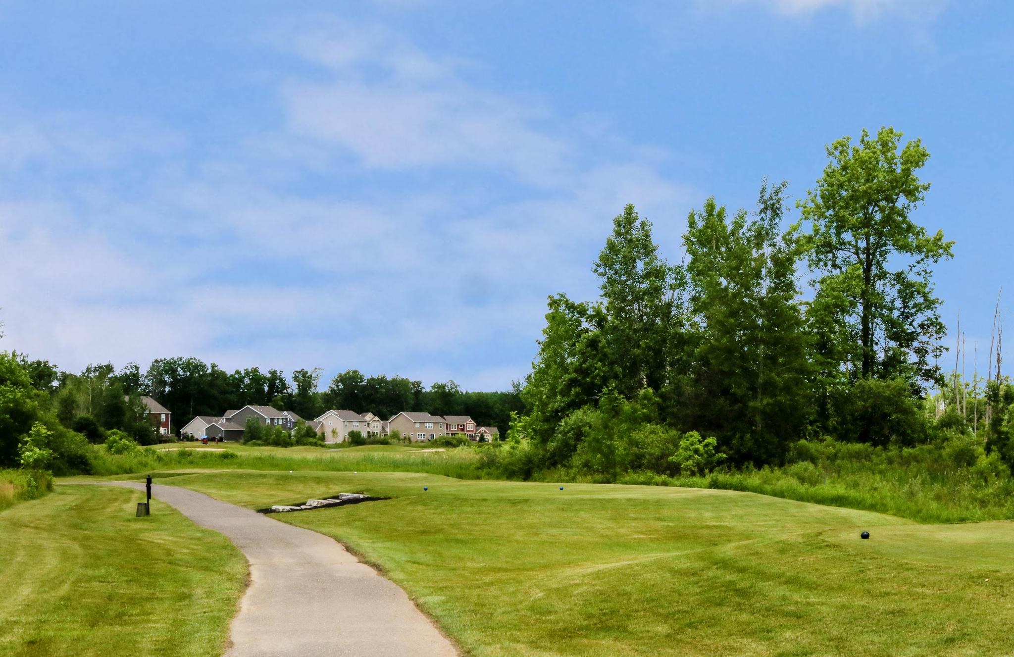 Golf cart path through Huntmore Estates\'s golf course