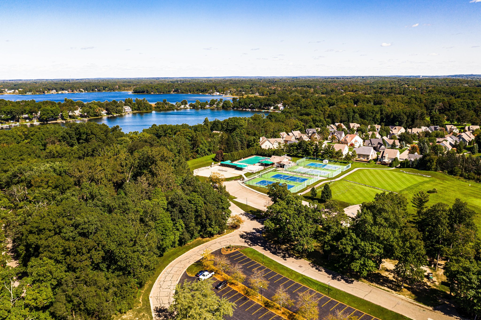 Aerial view of the tennis court and pools at Oak Pointe